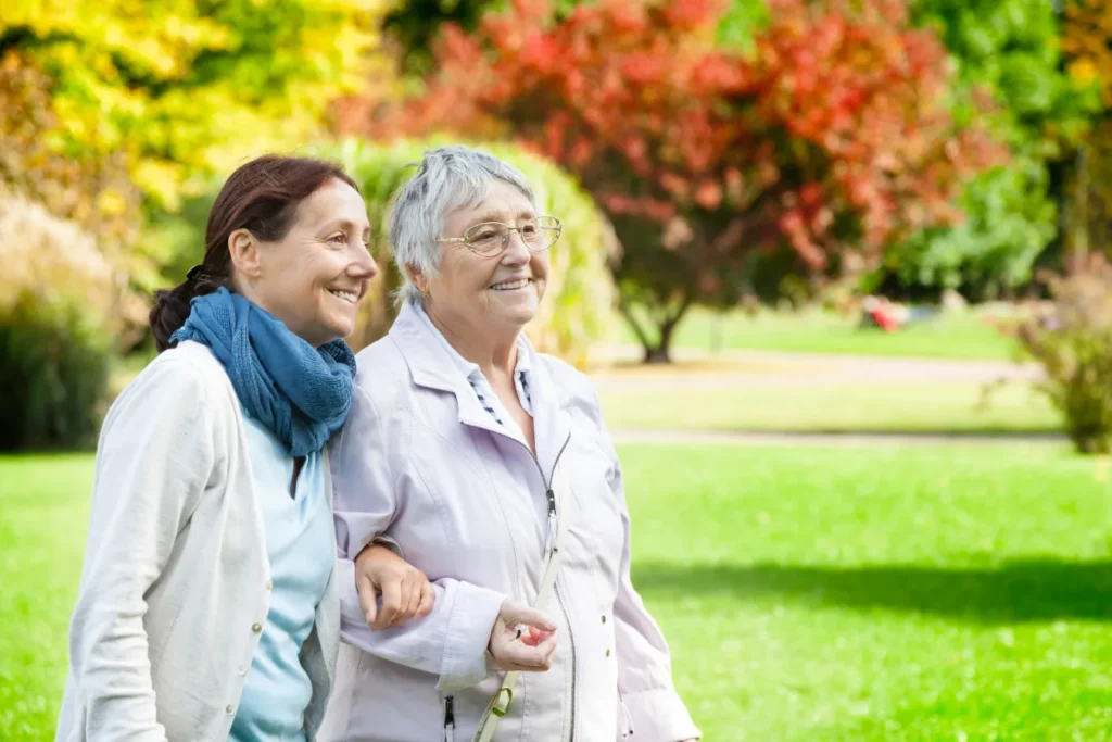 Elderly woman walking in the park