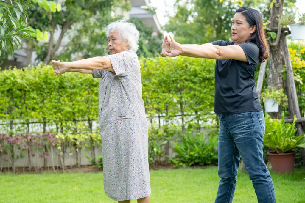 Older woman doing a exercise outdoors