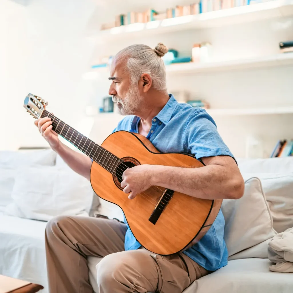 Man playing a guitar